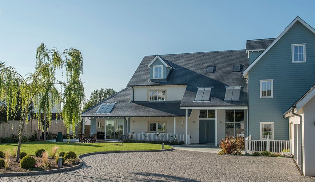 Colonial-style timber frame home exterior