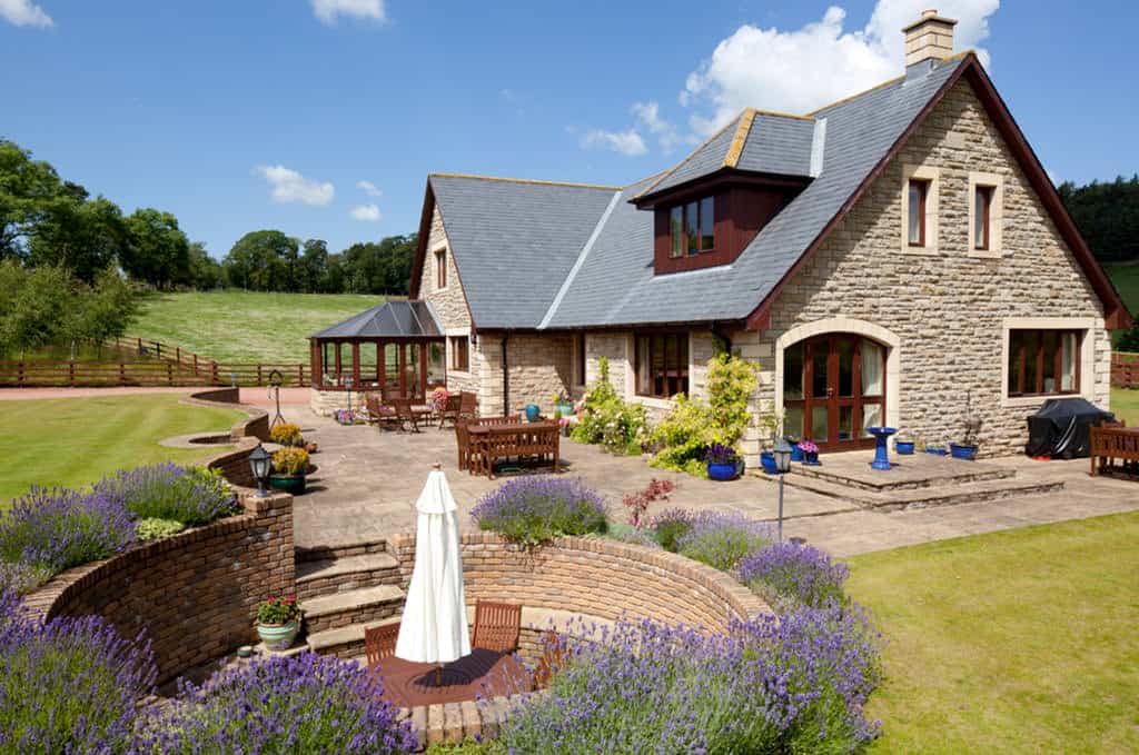 Timber frame home with an outdoor entertaining area in the countryside