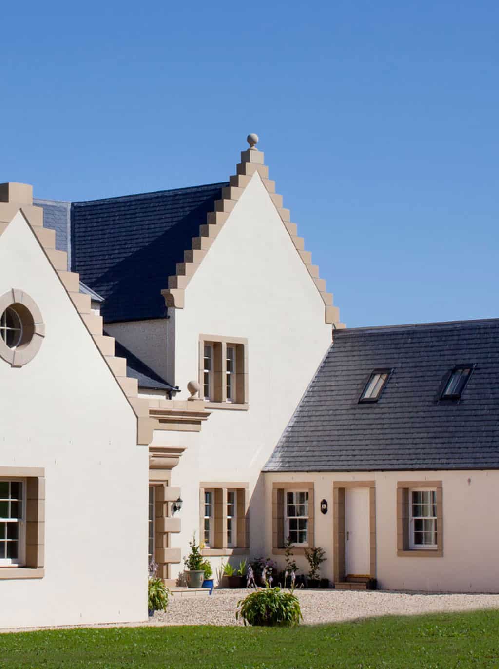 Crow-stepped gable detail on a timber frame home