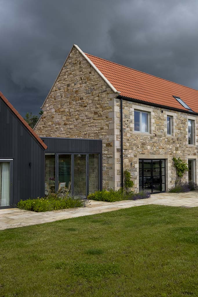 Timber and stone cladding mix exterior