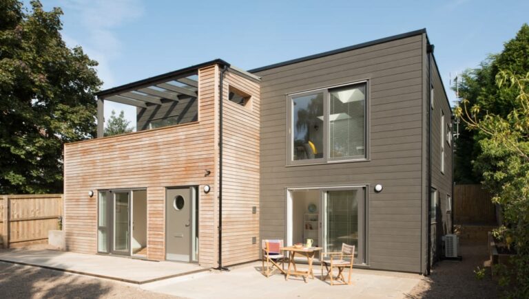 Modern sustainable timber frame home with large windows