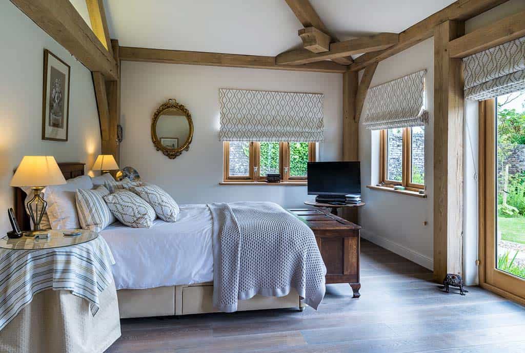 Oak-framed bedroom interior