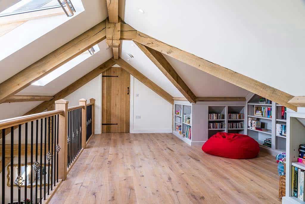 Oak-framed mezzanine overlooking the living space
