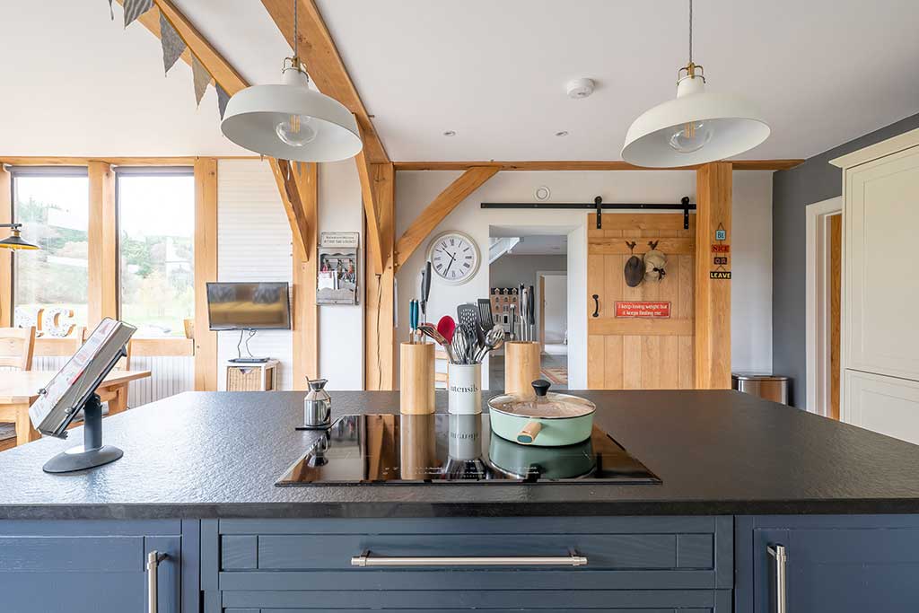Kitchen cooking area with hob and preparation space