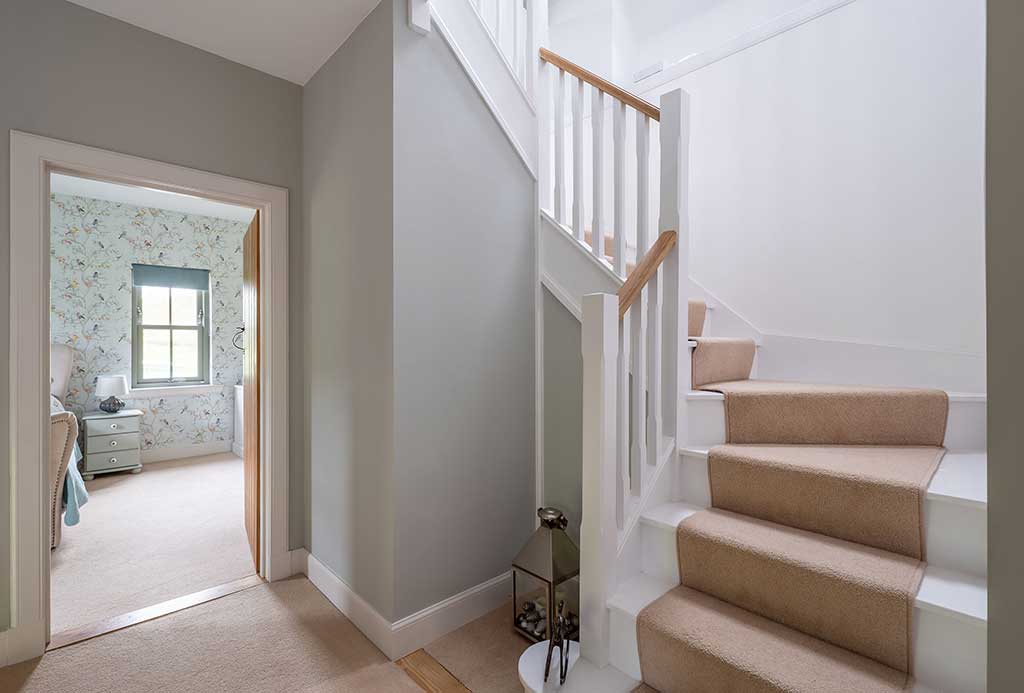 Wood and carpeted staircase interior