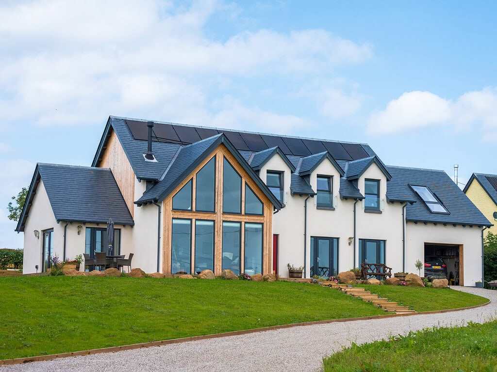 Timber frame self-build exterior, gable end and glazing detail