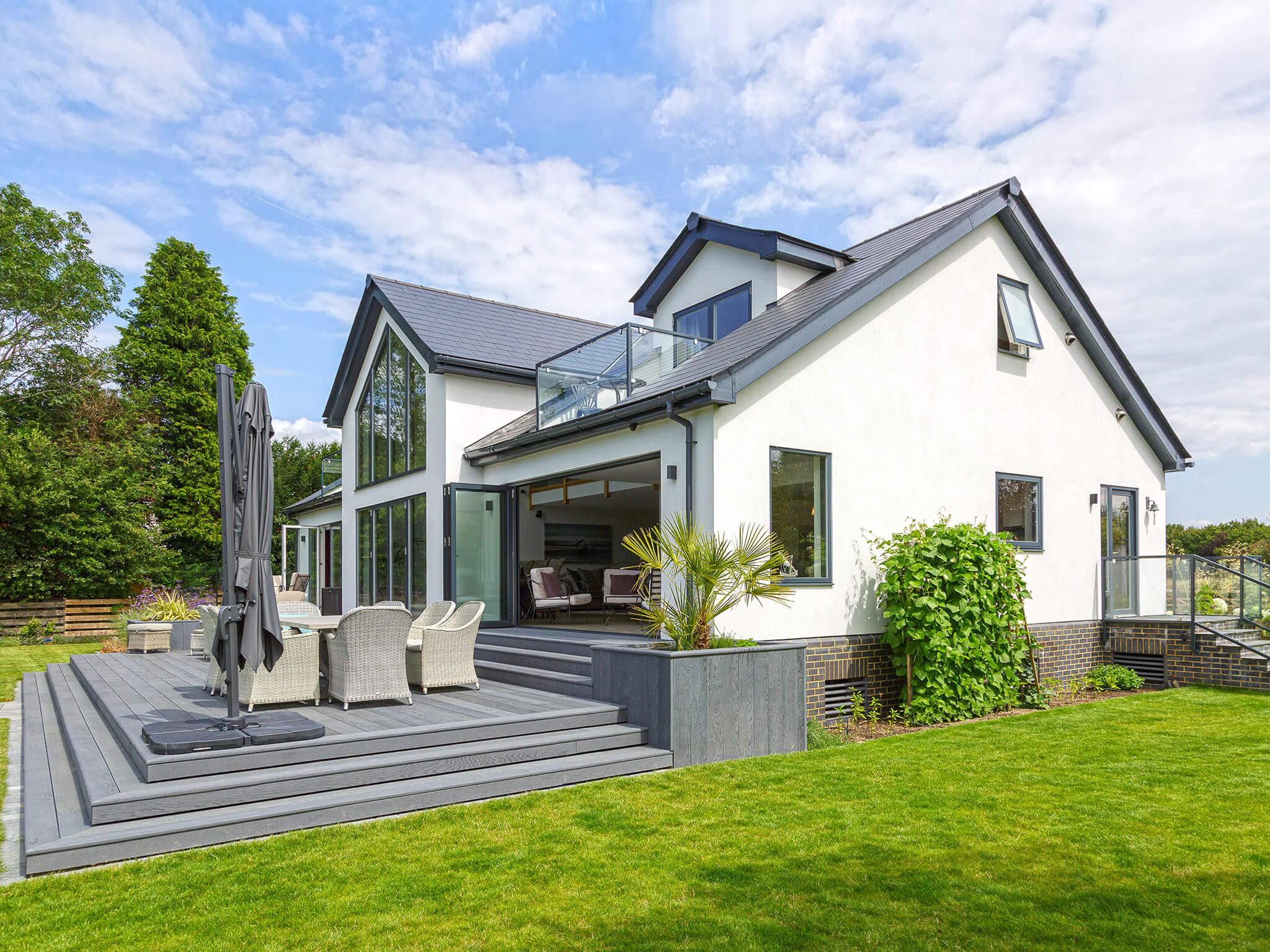 Garden-facing timber frame home exterior