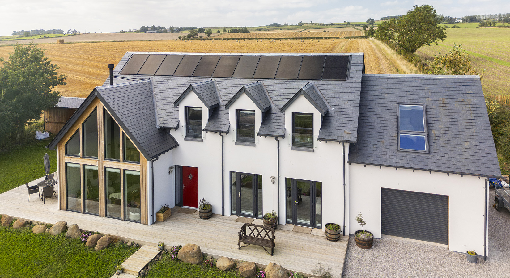 Timber frame home under construction - fast build speed benefits from front-loaded building warrant design