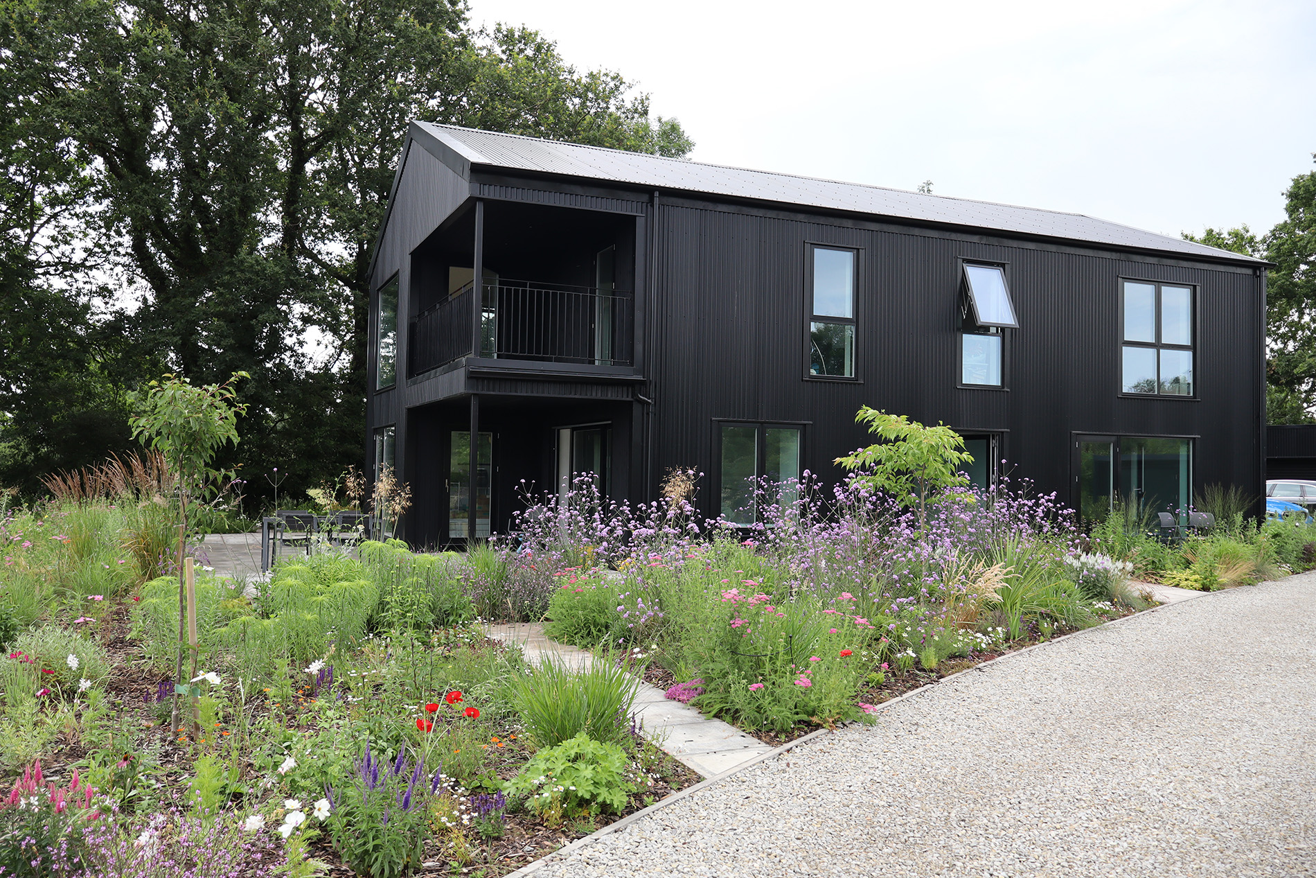 Christina and Andrew’s completed black barn-style self-build home in the Kent countryside.